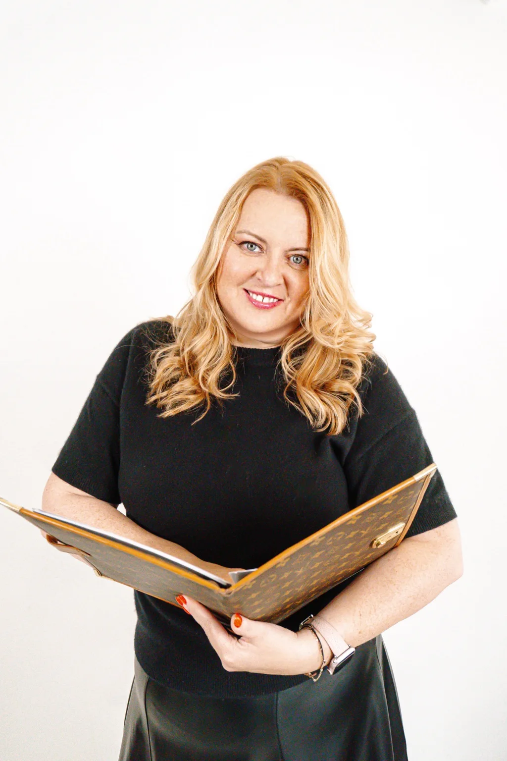 Andrea reviewing a planner